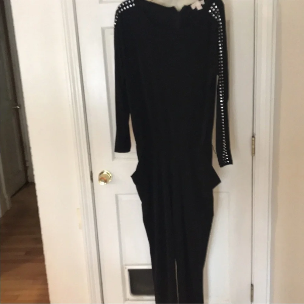 Micheal Kors size medium black long sleeve jumpsuit rhinestone embellished